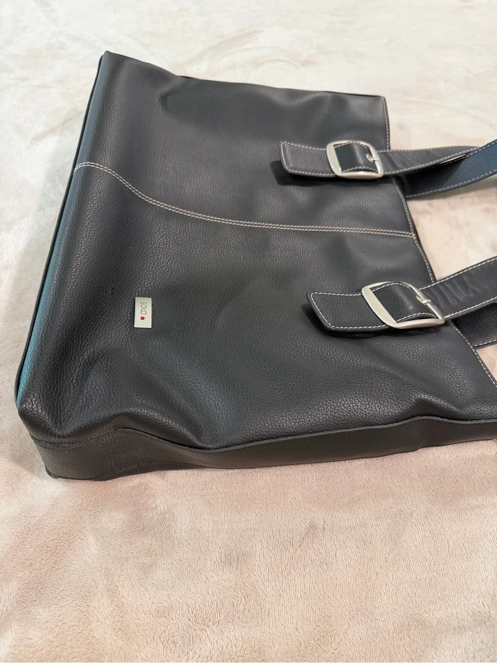 solo Black Textured Leather Bag with Silver Logo Plate and Red Accent